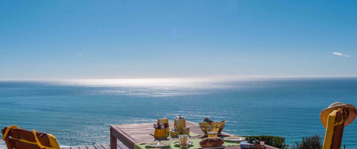 Blue sky, ocean as far as you can see, lunch table just for two. The real ocanfront luxury escape