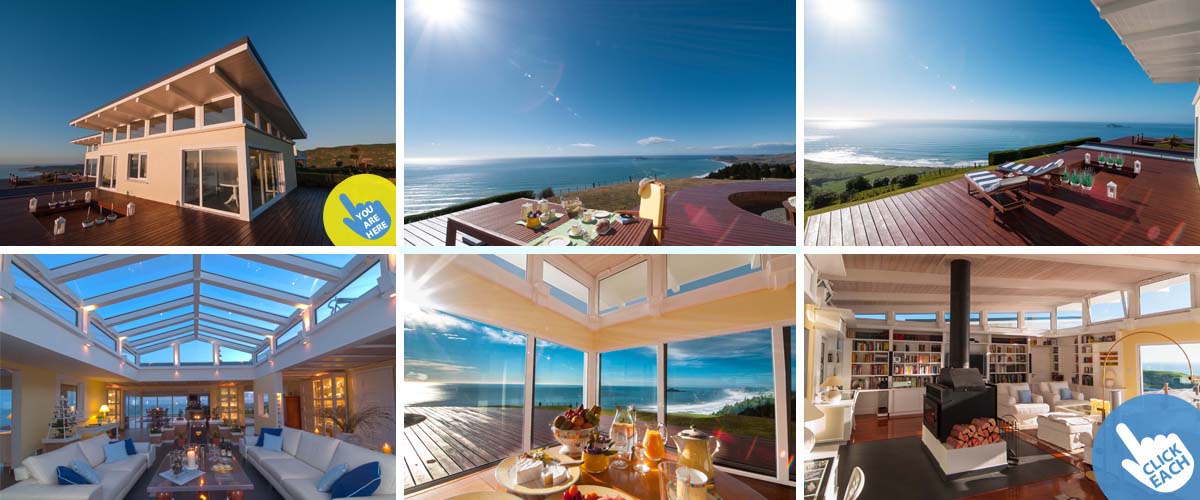 Luxury boutique lodge Napier, with ocean view deck, atrium, lounge with open fireplace and oceanfront breakfast table